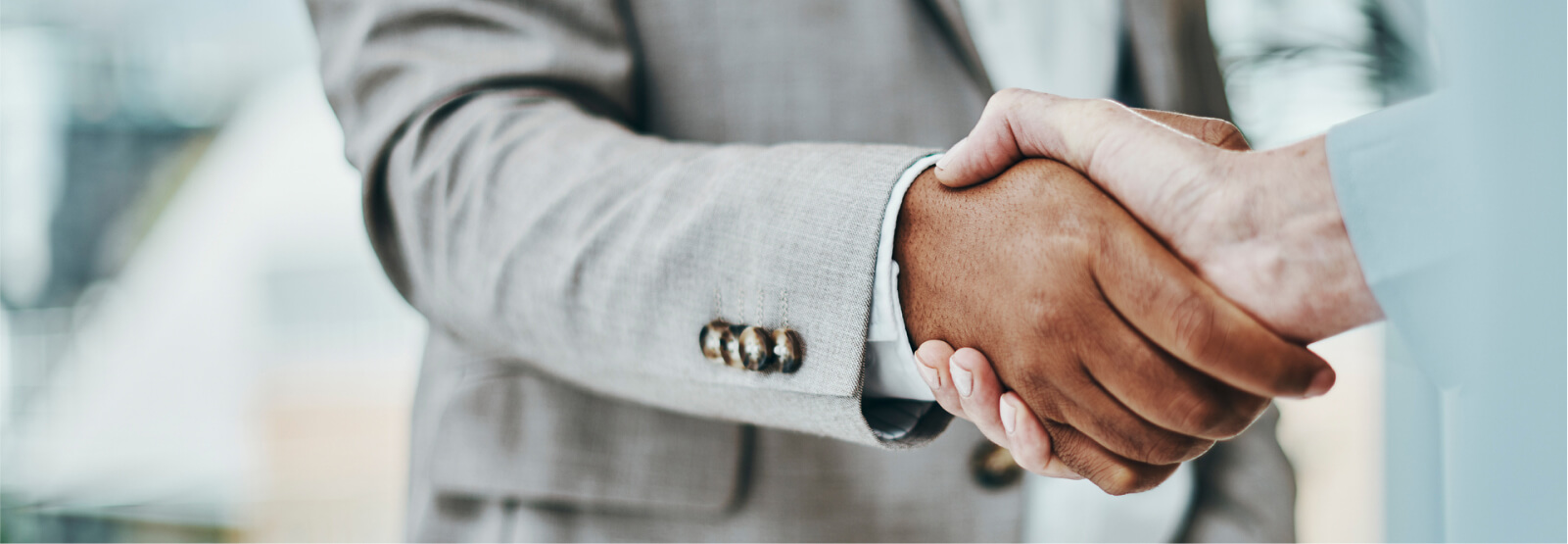 Two people shaking hands