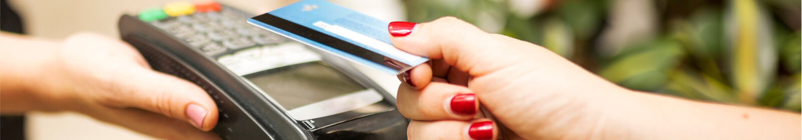 person using a debit/credit card for payment